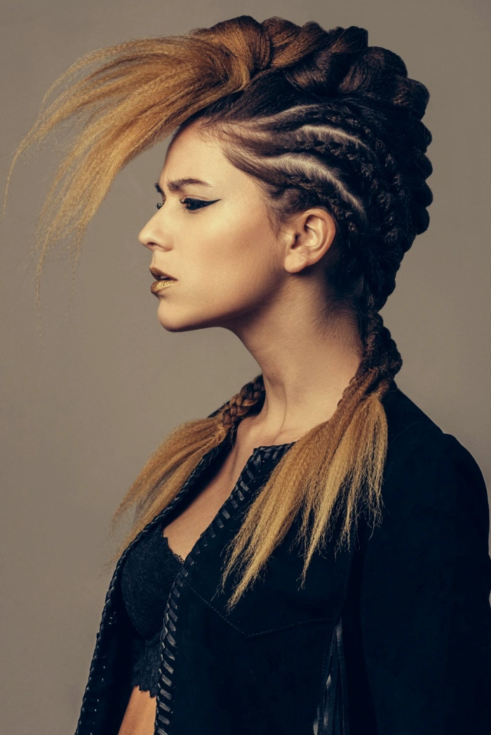 Punk faux hawk on long dark blonde hair with a bang